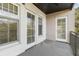 Balcony featuring a railing and access to the interior through two doors at 498 Albemarle Rd # 306, Charleston, SC 29407