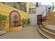 A charming courtyard features a decorative fountain, stone steps, and access to the main building at 498 Albemarle Rd # 306, Charleston, SC 29407