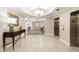 A well-lit hallway features elevators and stylish decor at 498 Albemarle Rd # 306, Charleston, SC 29407