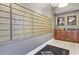 A wall of tenant mailboxes and a decorative table in a common mail area at 498 Albemarle Rd # 306, Charleston, SC 29407