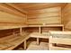 A wooden sauna provides a relaxing and rejuvenating experience with a wooden bucket and heater at 498 Albemarle Rd # 306, Charleston, SC 29407