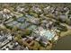 Aerial view of a luxury community with tennis courts and swimming pool at 5541 Green Dolphin Way, Kiawah Island, SC 29455