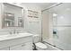 Clean bathroom with vanity, mirror, toilet, and glass enclosed shower at 5541 Green Dolphin Way, Kiawah Island, SC 29455
