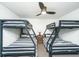 Cozy bedroom with matching bunk beds, perfect for accommodating guests at 5541 Green Dolphin Way, Kiawah Island, SC 29455