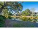 Scenic lakeside view showcasing the lush landscape and inviting facade of the lakeside homes at 5541 Green Dolphin Way, Kiawah Island, SC 29455