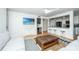 Bright and open living room with a bar, a TV and comfortable seating at 5541 Green Dolphin Way, Kiawah Island, SC 29455
