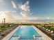 Gorgeous beachfront pool with lounge chairs and ocean views at 5541 Green Dolphin Way, Kiawah Island, SC 29455