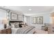 Bright bedroom featuring elegant decor, neutral tones, and comfortable furnishings at 7002 Deanston Dr, Ravenel, SC 29470