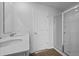 Bright bathroom with double sink vanity and glass door shower at 7014 Deanston Dr, Ravenel, SC 29470