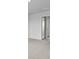 Bright bedroom features neutral walls, carpet, and an open doorway at 7014 Deanston Dr, Ravenel, SC 29470