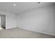 Bright bedroom offers neutral walls, carpet, and recessed lighting at 7014 Deanston Dr, Ravenel, SC 29470