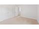 Bedroom featuring a door to the side, window, and a closet at 7018 Deanston Dr, Ravenel, SC 29470