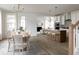 Open concept dining area flowing from the kitchen, perfect for entertaining guests at 711 Alma Square Dr, Moncks Corner, SC 29461