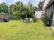Spacious backyard with a fire pit and outdoor seating at 715 Hampton St, Walterboro, SC 29488
