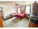 This bedroom has hardwood flooring and green rug at 715 Hampton St, Walterboro, SC 29488