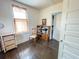 Bedroom features wood floors and lots of light at 715 Hampton St, Walterboro, SC 29488