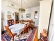 Bright dining room with hardwood floors and beautiful chandelier at 715 Hampton St, Walterboro, SC 29488