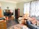 Cozy living room with a comfortable sofa and patterned area rug at 715 Hampton St, Walterboro, SC 29488