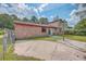 Private backyard showcasing a patio and lush greenery at 7791 Peppercorn Ln, North Charleston, SC 29420