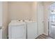 Convenient laundry room with modern, front-load washer and dryer at 7791 Peppercorn Ln, North Charleston, SC 29420