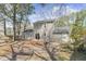 A spacious backyard with a deck, patio furniture, and a well-maintained lawn at 7932 Riverbirch Ln, North Charleston, SC 29418
