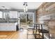 Kitchen with stainless steel appliances, granite countertops, and natural light at 7932 Riverbirch Ln, North Charleston, SC 29418