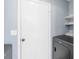 Convenient laundry room area with washer and dryer hookups with a modern gray appliance at 7932 Riverbirch Ln, North Charleston, SC 29418