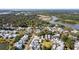 Breathtaking aerial view showcasing the community's well-manicured lawns, winding roads, and scenic surroundings at 8067 Jack Island Dr, Johns Island, SC 29455