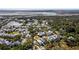 Expansive aerial view showcases the community's coastal location, surrounded by lush greenery and waterways at 8067 Jack Island Dr, Johns Island, SC 29455