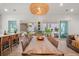 Spacious dining area flows into the living spaces with plenty of natural light at 8067 Jack Island Dr, Johns Island, SC 29455