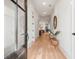 Inviting entryway showcasing hardwood floors and access to multiple rooms at 8067 Jack Island Dr, Johns Island, SC 29455
