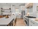 Bright kitchen featuring stainless steel appliances and a center island with seating at 8067 Jack Island Dr, Johns Island, SC 29455