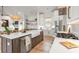 Spacious kitchen features a center island, stainless steel appliances, and custom cabinets at 8067 Jack Island Dr, Johns Island, SC 29455