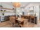 Open kitchen and dining area with modern appliances and stylish decor at 8067 Jack Island Dr, Johns Island, SC 29455