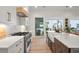 Gourmet kitchen with stainless steel appliances and a large island for gathering at 8067 Jack Island Dr, Johns Island, SC 29455