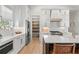 Bright kitchen features stainless appliances, quartz countertops, and a walk-in pantry at 8067 Jack Island Dr, Johns Island, SC 29455