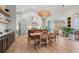 Open kitchen and dining area with modern design and a view to the outside at 8067 Jack Island Dr, Johns Island, SC 29455