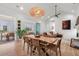 Open floor plan with a dining table and a living room, plus access to the patio at 8067 Jack Island Dr, Johns Island, SC 29455