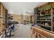An indoor workshop with shelving, various tools, and workbenches at 8067 Jack Island Dr, Johns Island, SC 29455