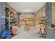 A workshop with shelving contains tools and building supplies at 8067 Jack Island Dr, Johns Island, SC 29455
