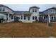 Spacious backyard with a patio and partial fence for added privacy at 818 Descartes St, Summerville, SC 29486