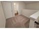 Open space at the top of the stairs featuring a view of the bathroom at 818 Descartes St, Summerville, SC 29486