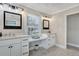 Elegant bathroom with dual sinks, ample counter space, and a stylish makeup vanity, perfect for daily routines at 847 Quail Dr, Charleston, SC 29412