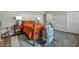 Bedroom featuring vintage furnishings, wood floors, an area rug, and good light at 847 Quail Dr, Charleston, SC 29412