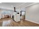 Open kitchen with stainless appliances, breakfast nook, and view into the living room at 847 Quail Dr, Charleston, SC 29412