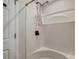 Clean white shower stall with bronze hardware, providing a functional and stylish bathing space at 847 Quail Dr, Charleston, SC 29412