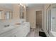Bathroom features dual sinks, modern vanity, and separate shower with glass door at 9000 Hema Ln, Summerville, SC 29483
