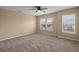 Bright, carpeted bedroom with natural light from large windows at 9000 Hema Ln, Summerville, SC 29483