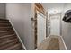 Inviting hallway with wood accent wall, showcasing the home's unique architectural details and design at 9000 Hema Ln, Summerville, SC 29483