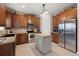 Charming kitchen features stainless steel appliances, tile backsplash, and a central island at 9000 Hema Ln, Summerville, SC 29483